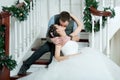 Wedding pair, kiss on stairs