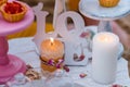 Wedding or party candy bar, decorated dessert table in pink color with cakes. Shabby chic style Royalty Free Stock Photo