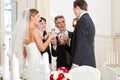 Wedding party clinking glasses Royalty Free Stock Photo