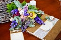 Wedding photo album bouquet eucalyptus cotton and other flowers.