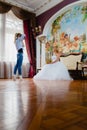 Wedding photographer is shooting portrait of the bride Royalty Free Stock Photo