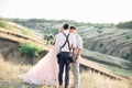 Wedding photographer takes pictures of bride and groom Royalty Free Stock Photo