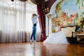 Wedding photographer is taking pictures the bride Royalty Free Stock Photo