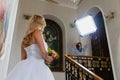 Wedding photographer is taking pictures the bride Royalty Free Stock Photo