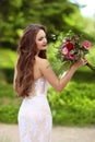 Wedding Portrait Of Beautiful Happy Bride with long wavy hair we Royalty Free Stock Photo