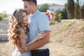 Wedding portrait of bride and groom outdoors in summer