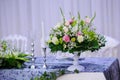 Wedding presidium table with white and grey tablecloth,
