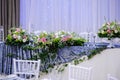 Wedding presidium table with white and grey tablecloth