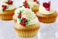 Wedding reception cupcakes decorated with sugarcraft red roses Royalty Free Stock Photo