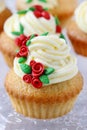 Wedding reception cupcakes decorated with sugarcraft red roses Royalty Free Stock Photo