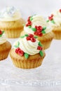 Wedding reception cupcakes decorated with sugarcraft red roses Royalty Free Stock Photo