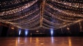 A wedding reception dance floor under a canopy of string lights and Royalty Free Stock Photo