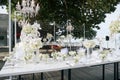 The white cream roses, orchids decoration on the reception dinner table, flowers, Floral - closed up Royalty Free Stock Photo