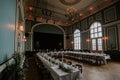 Wedding reception hall with an elegant table setting with candles