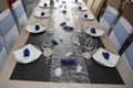 Wedding reception table place ready for guests in blue white set style marriage Royalty Free Stock Photo