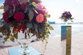 Wedding decor. Wedding registration outdoor. Luxury bouquets with red flowers