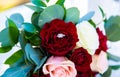 Wedding ring on a bouquet of roses Royalty Free Stock Photo