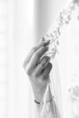 Wedding ring on bride`s finger, engagement, woman`s hand close-up, soft focus, black and white shot Royalty Free Stock Photo