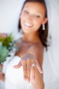Wedding ring, hand and bride with diamond, jewellery and pride for commitment, celebration or marriage. Happy, woman and