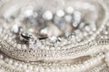 Wedding ring on sequins and pearls Royalty Free Stock Photo