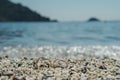 Wedding rings on the beach on the background blue sea,