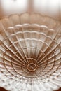 Wedding rings in a beautiful glass. golden engagement ring with diamond in a lace glass bowl background. selective focus Royalty Free Stock Photo