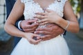 Wedding rings being exchanged in outdoor