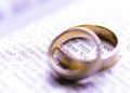 Wedding rings on a Bible with I Love You message Royalty Free Stock Photo