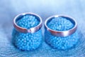 Wedding rings on blue candies Royalty Free Stock Photo