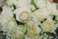 Wedding rings on a bouquet of flowers