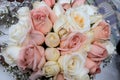 Wedding rings on a bouquet of white roses Royalty Free Stock Photo