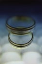 Wedding rings in cold colors with reflection Royalty Free Stock Photo