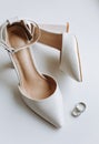 wedding rings composition details bridesmaid shoes heels Royalty Free Stock Photo