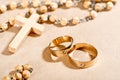 Wedding Rings and Cross Royalty Free Stock Photo