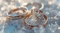 Wedding rings among crystals and diamonds, jewerly banner. Sparkling wedding rings on crystal clear frosty surface. Diamond Royalty Free Stock Photo