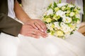 Wedding rings and flowers Royalty Free Stock Photo