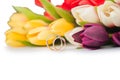 The wedding rings and flowers isolated on white background Royalty Free Stock Photo