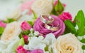 Wedding rings in flowers Royalty Free Stock Photo