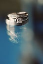 Wedding Rings on Glass Table Royalty Free Stock Photo