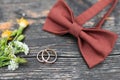 Wedding rings on the groom tie Royalty Free Stock Photo