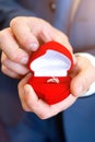 Wedding rings in hand. wedding rings in the hands of the groom.