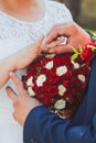 wedding rings and hands of bride and groom. young wedding couple at ceremony. matrimony. man and woman in love. two happy people c Royalty Free Stock Photo