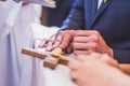 Wedding rings, hands, wedding ceremony in church Royalty Free Stock Photo