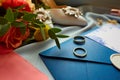 Wedding rings and wedding invitation. Shallow dof Royalty Free Stock Photo