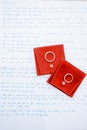 Wedding rings lie on red jewelry cases at a wedding vow Royalty Free Stock Photo