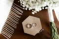 Wedding rings lie on a wooden box Royalty Free Stock Photo