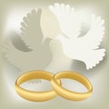 Wedding rings with pigeons