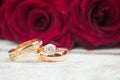 Wedding rings. Red roses Royalty Free Stock Photo