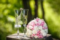 Wedding rings with roses and glasses of champagne Royalty Free Stock Photo