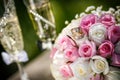 Wedding rings with roses and glasses of champagne Royalty Free Stock Photo